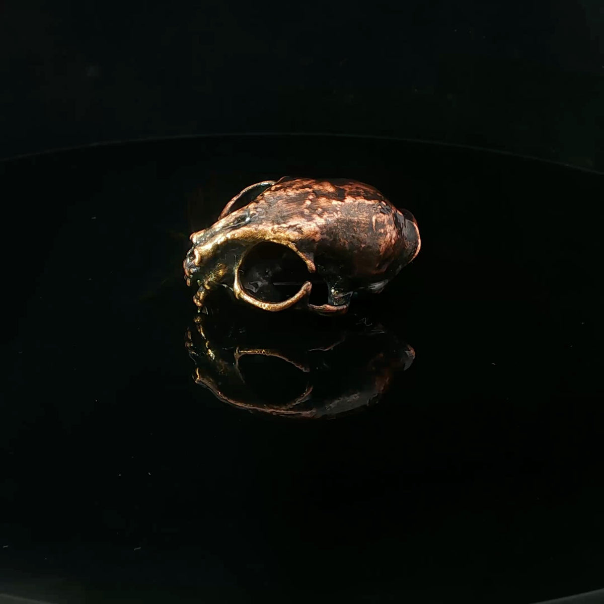 Miniature skull brooch made using copper electroforming