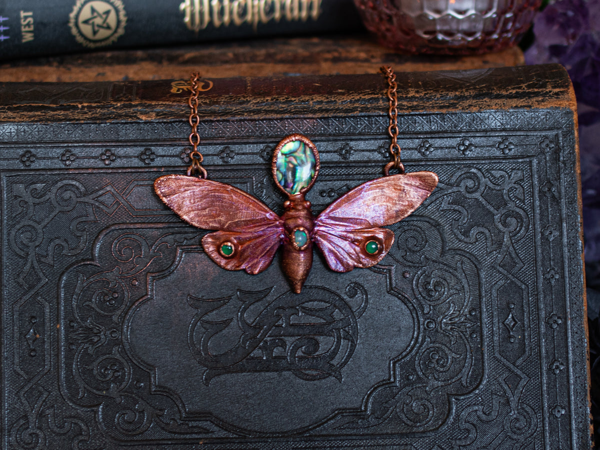 Cicada pendant electroformed in copper with Ethiopian opal and abalone