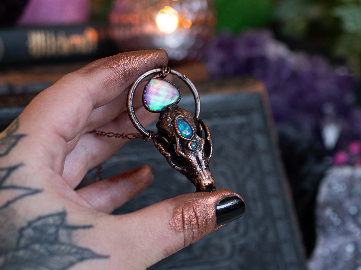Fox skull pendant with Ethiopian opals and Aurora opal doublet