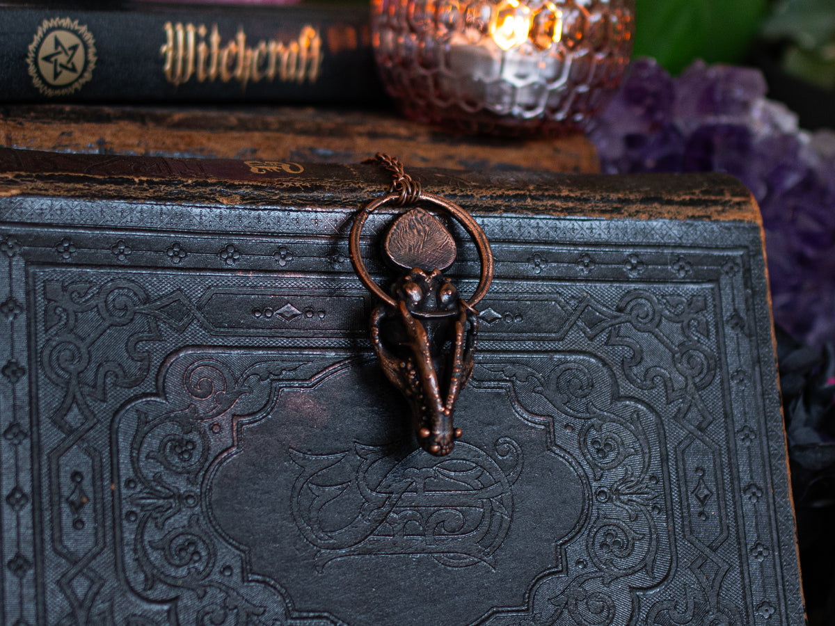 Dark vintage copper fox skull pendant with colourful Ethiopian and Aurora opals
