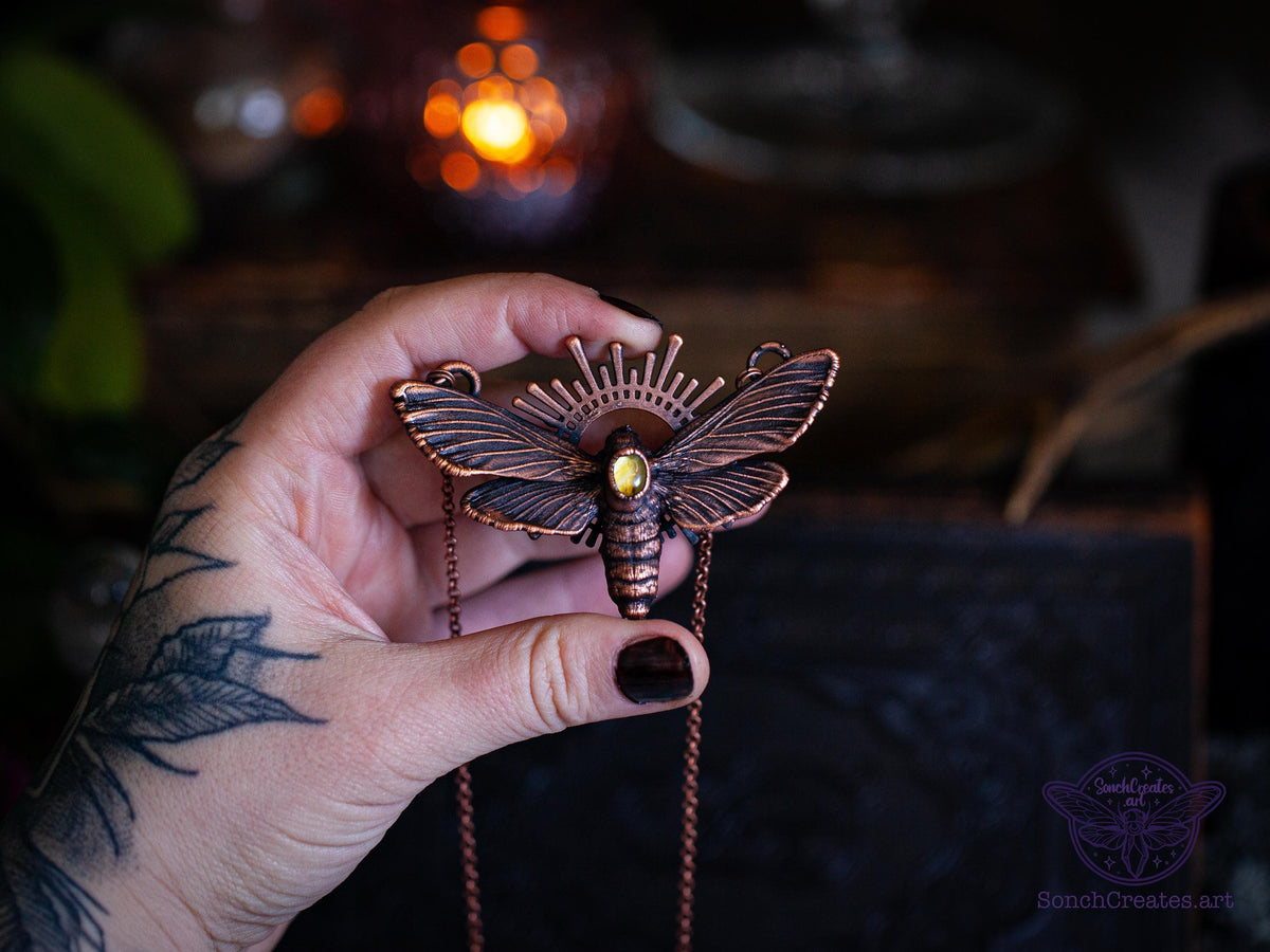 Handmade resin moth necklace electroformed in copper with citrine
