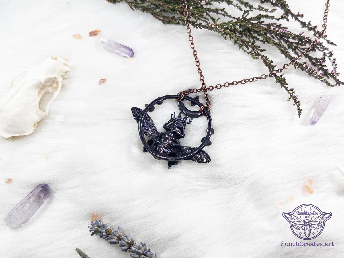 Five natural citrine gemstones on a dark copper beetle necklace